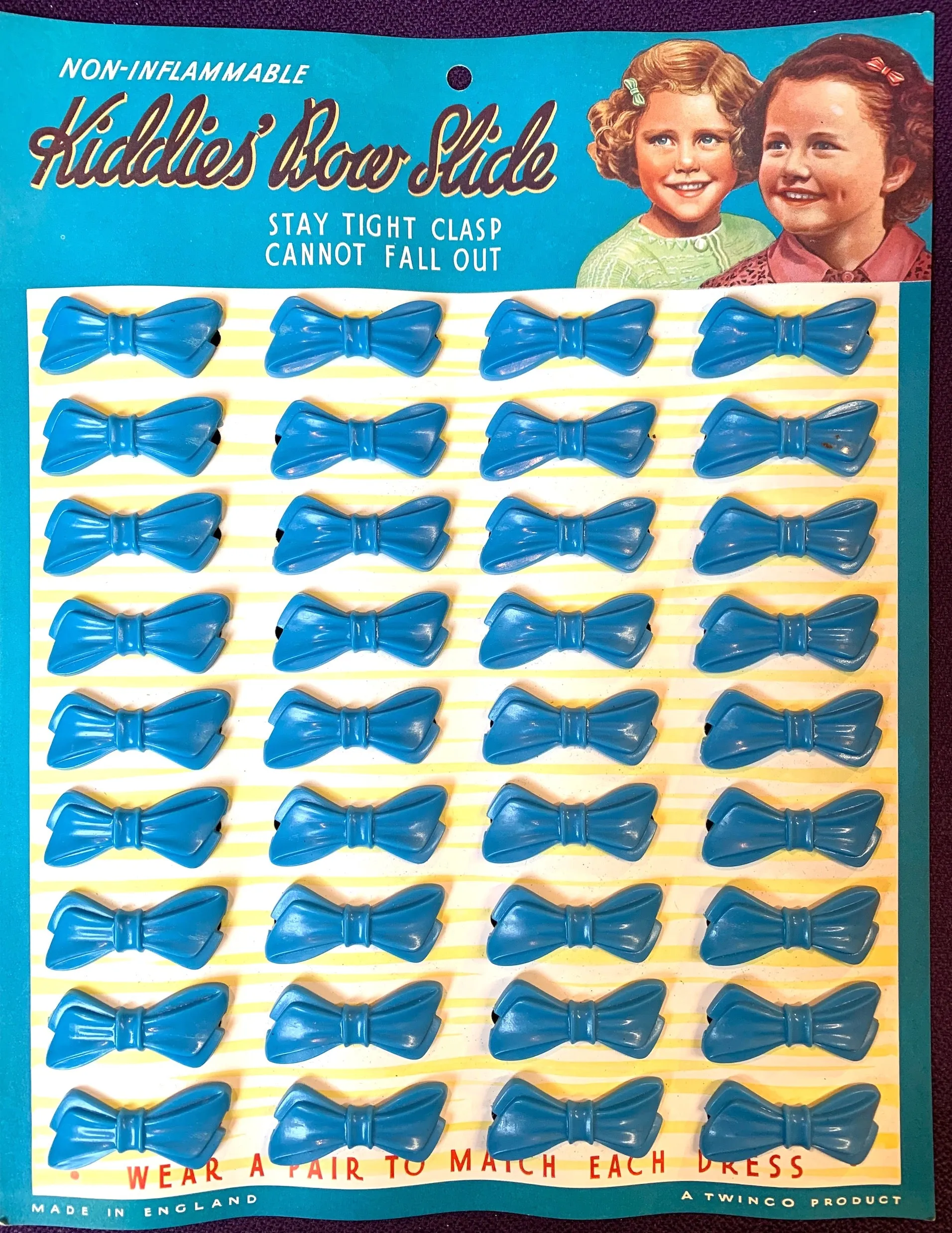 Delightful 1940s Shop Display Card of 36 Blue Bow Hair Clips