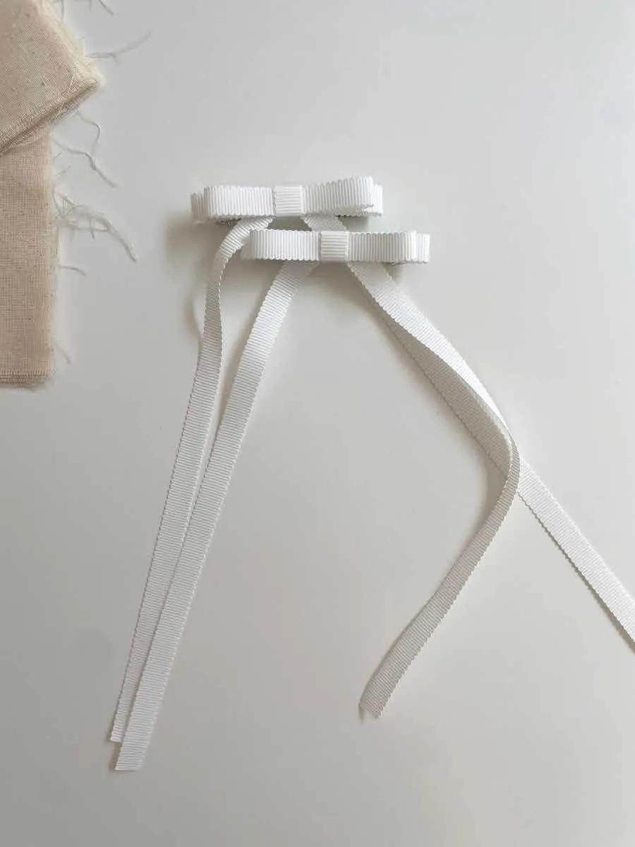 Long tail double bow clip set