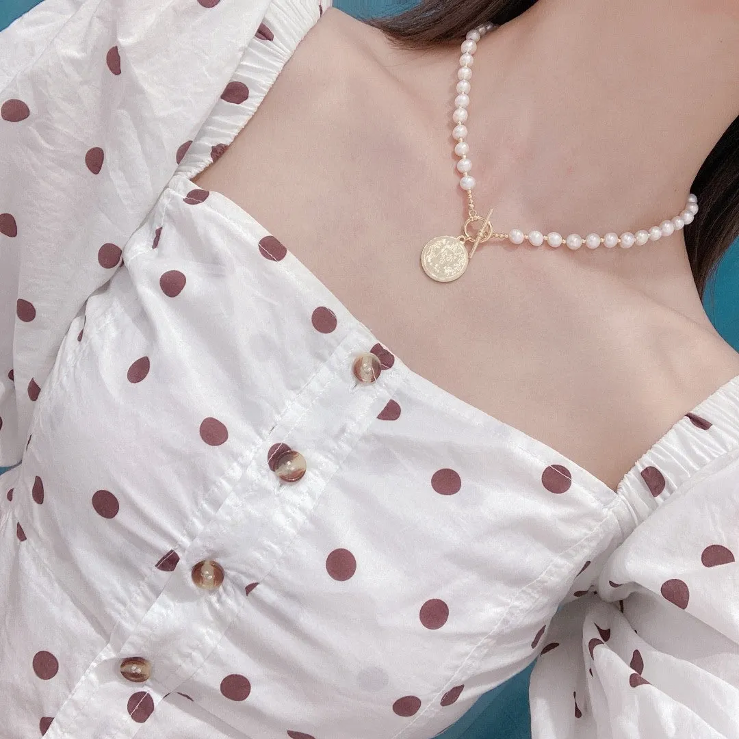 Natural pearl necklace with gold coin pendant