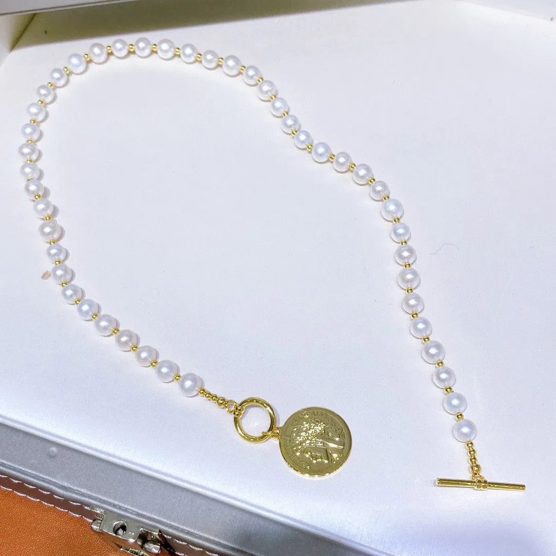 Natural pearl necklace with gold coin pendant