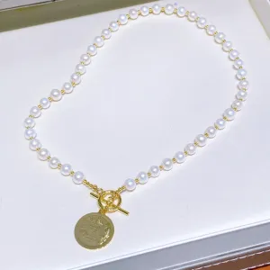 Natural pearl necklace with gold coin pendant