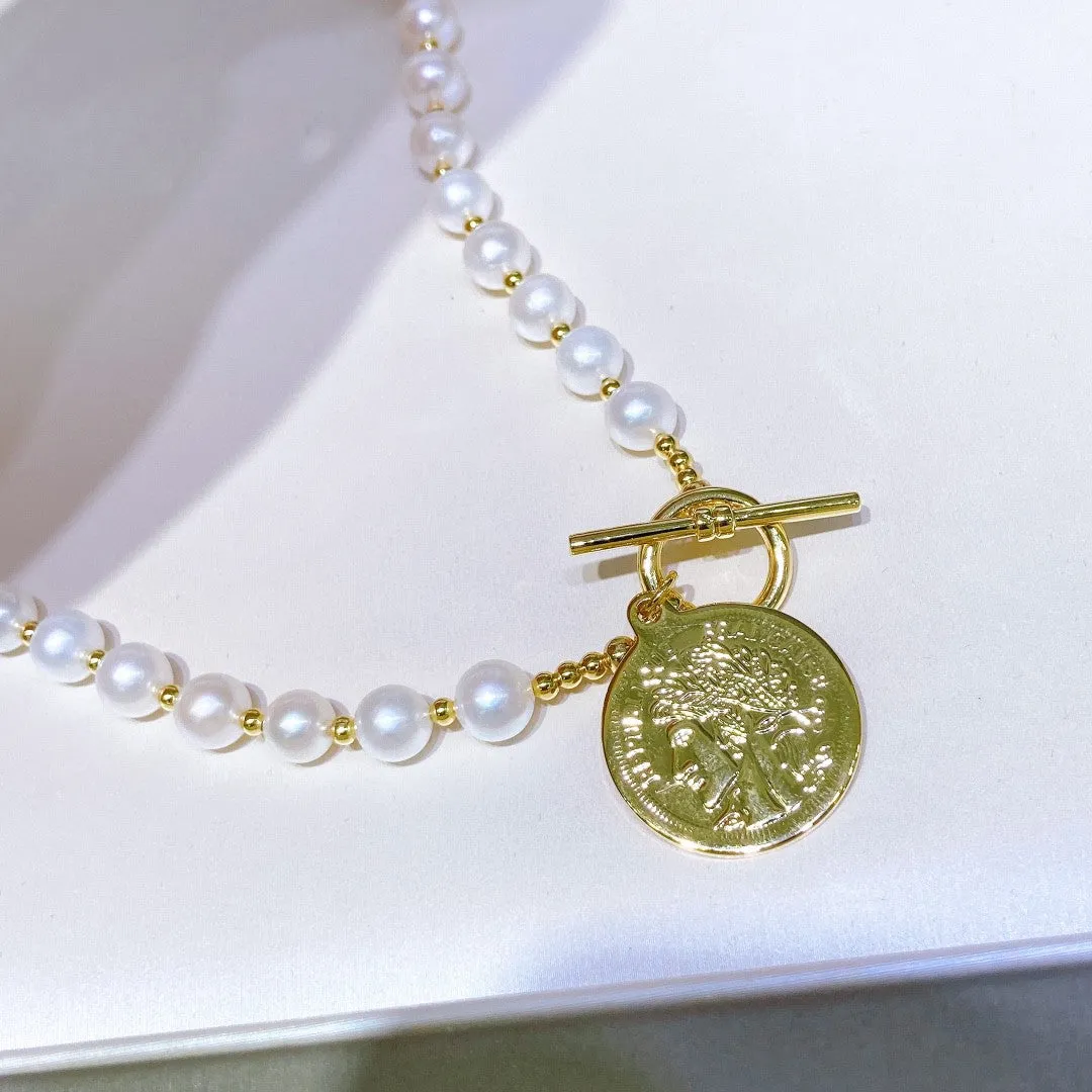 Natural pearl necklace with gold coin pendant