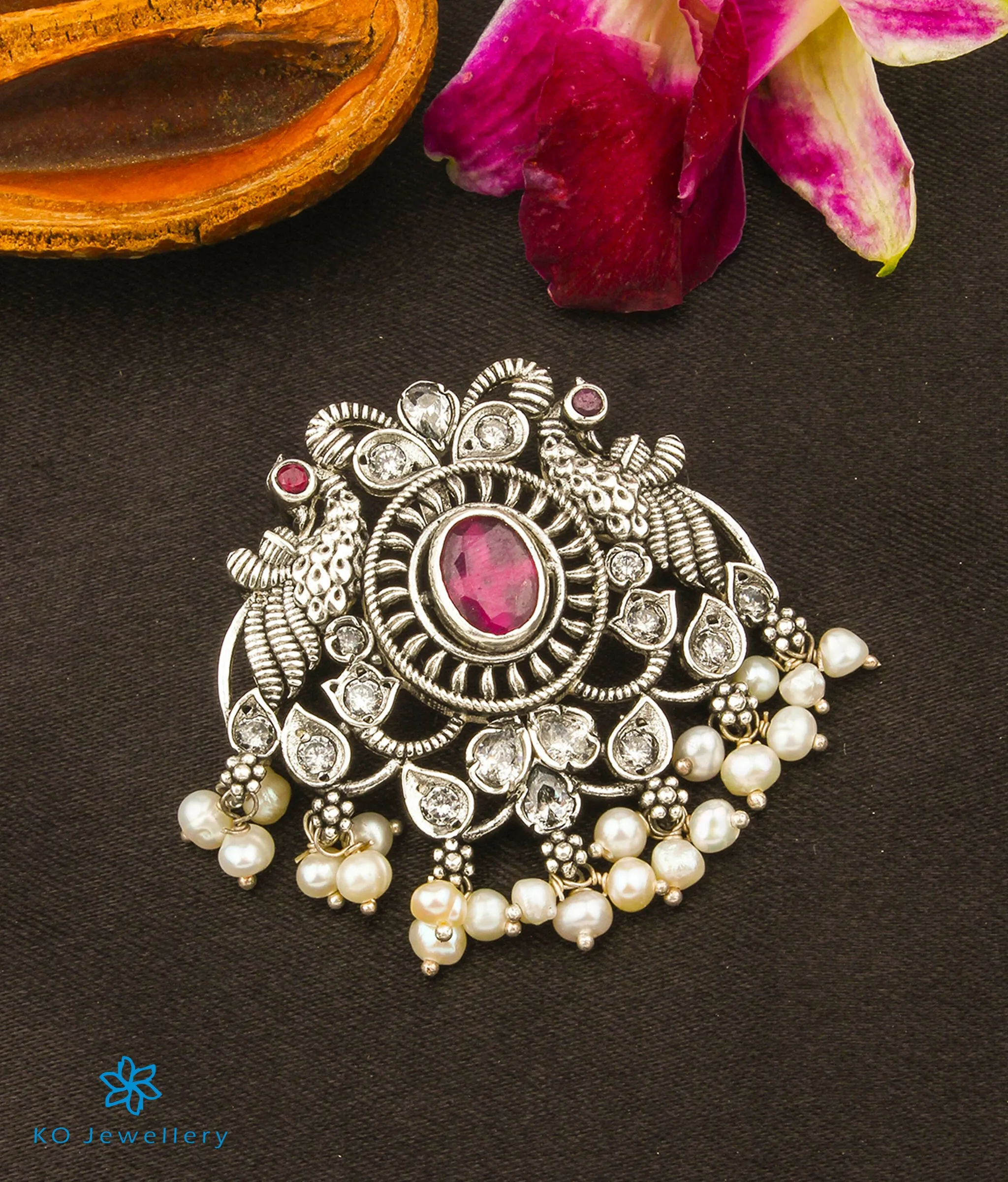 The Anviya Silver Peacock Pendant